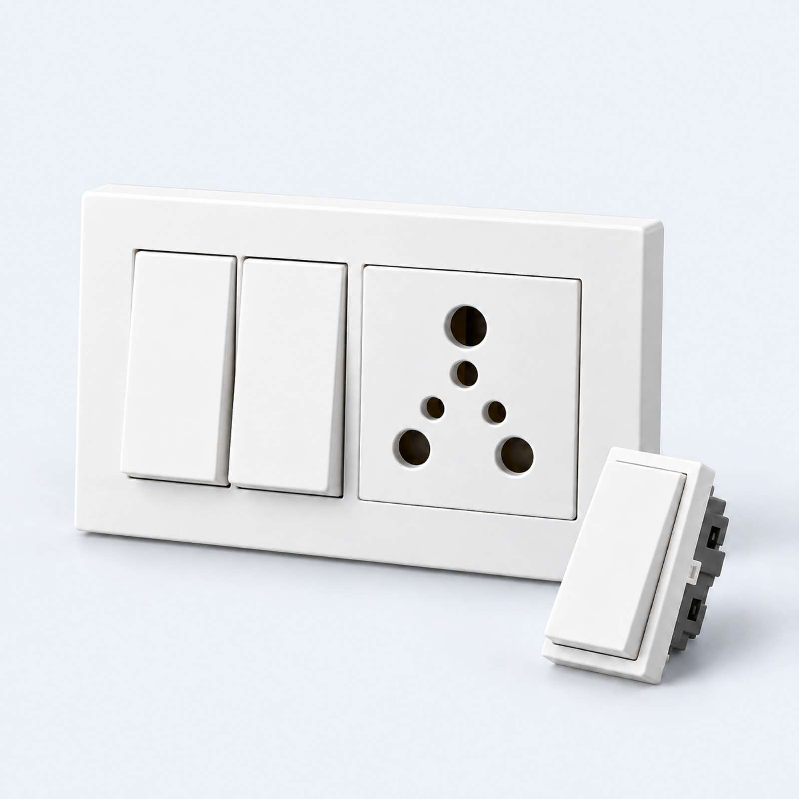 Modular switch plate with switches and socket.
